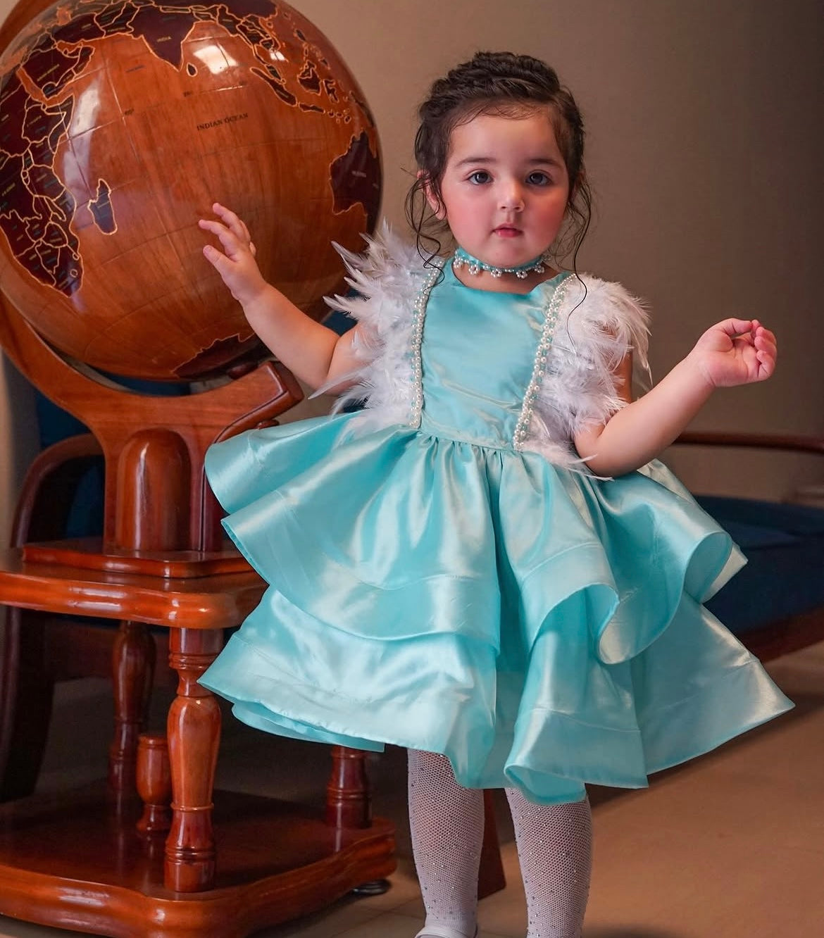 Beautiful Satan feathery frock with an adjustable back