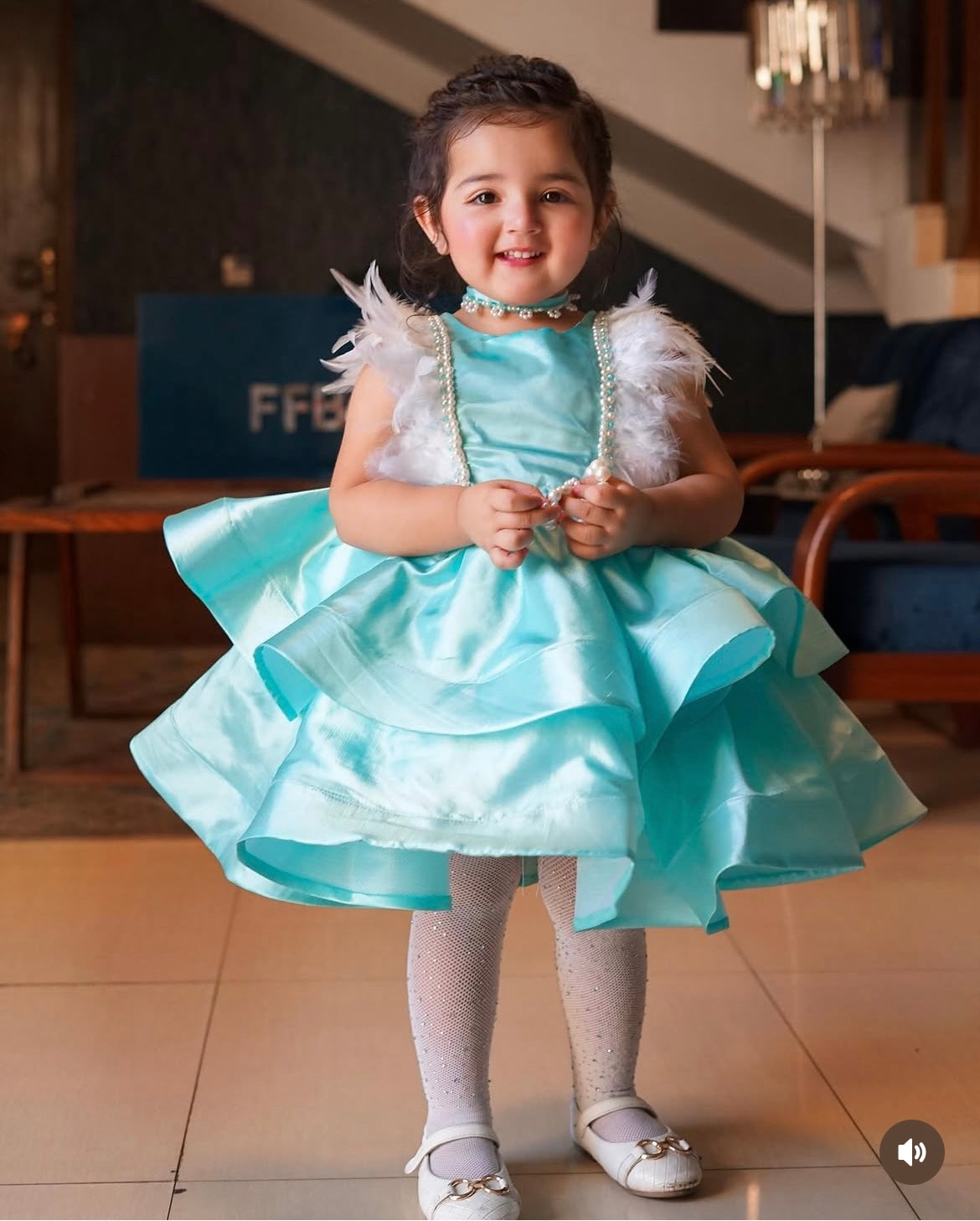 Beautiful Satan feathery frock with an adjustable back