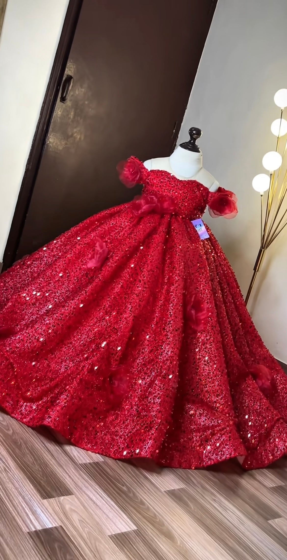 Stylish squein ball gown having 3D flowers with an invisible shoulder style