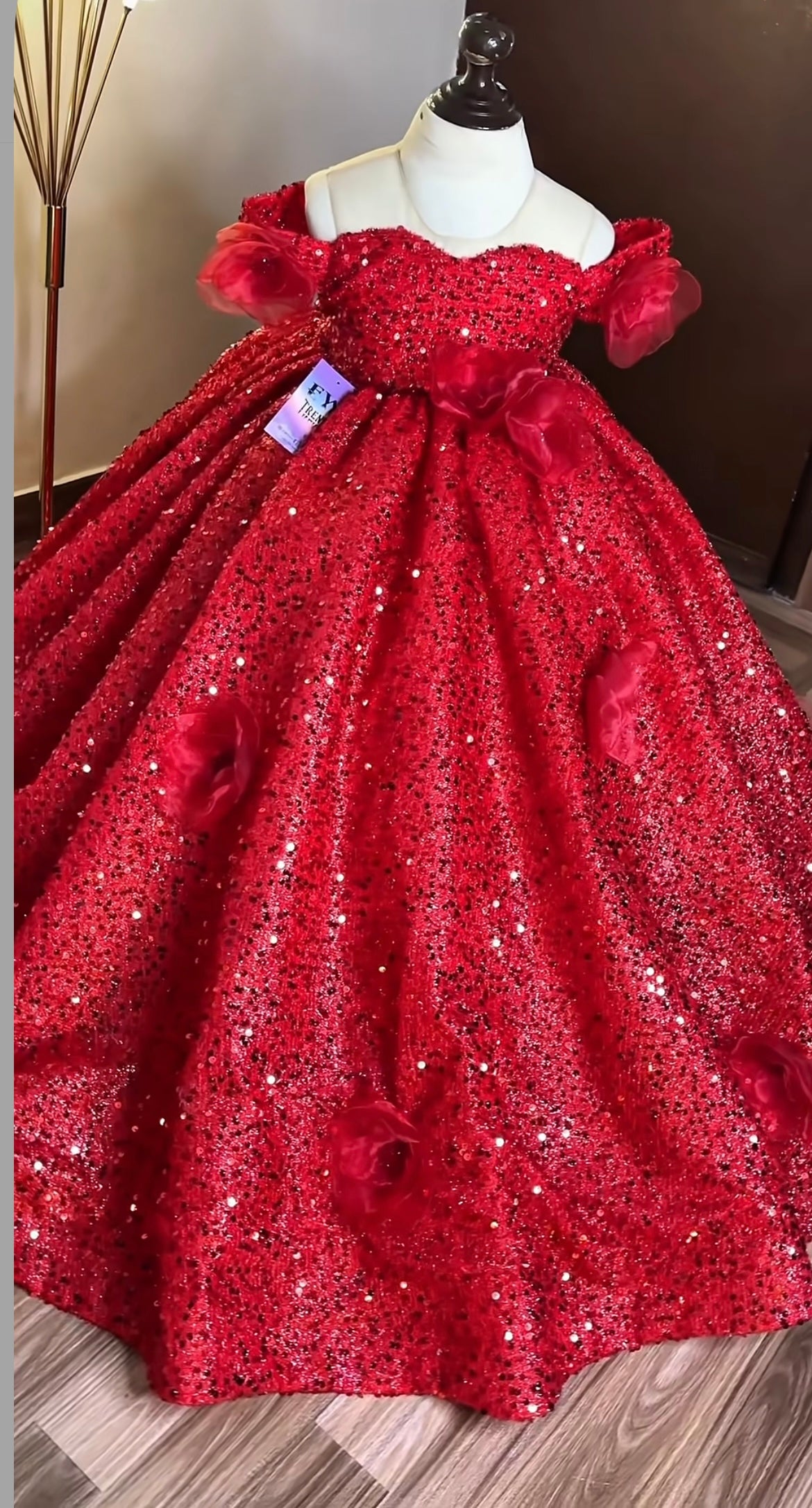 Stylish squein ball gown having 3D flowers with an invisible shoulder style